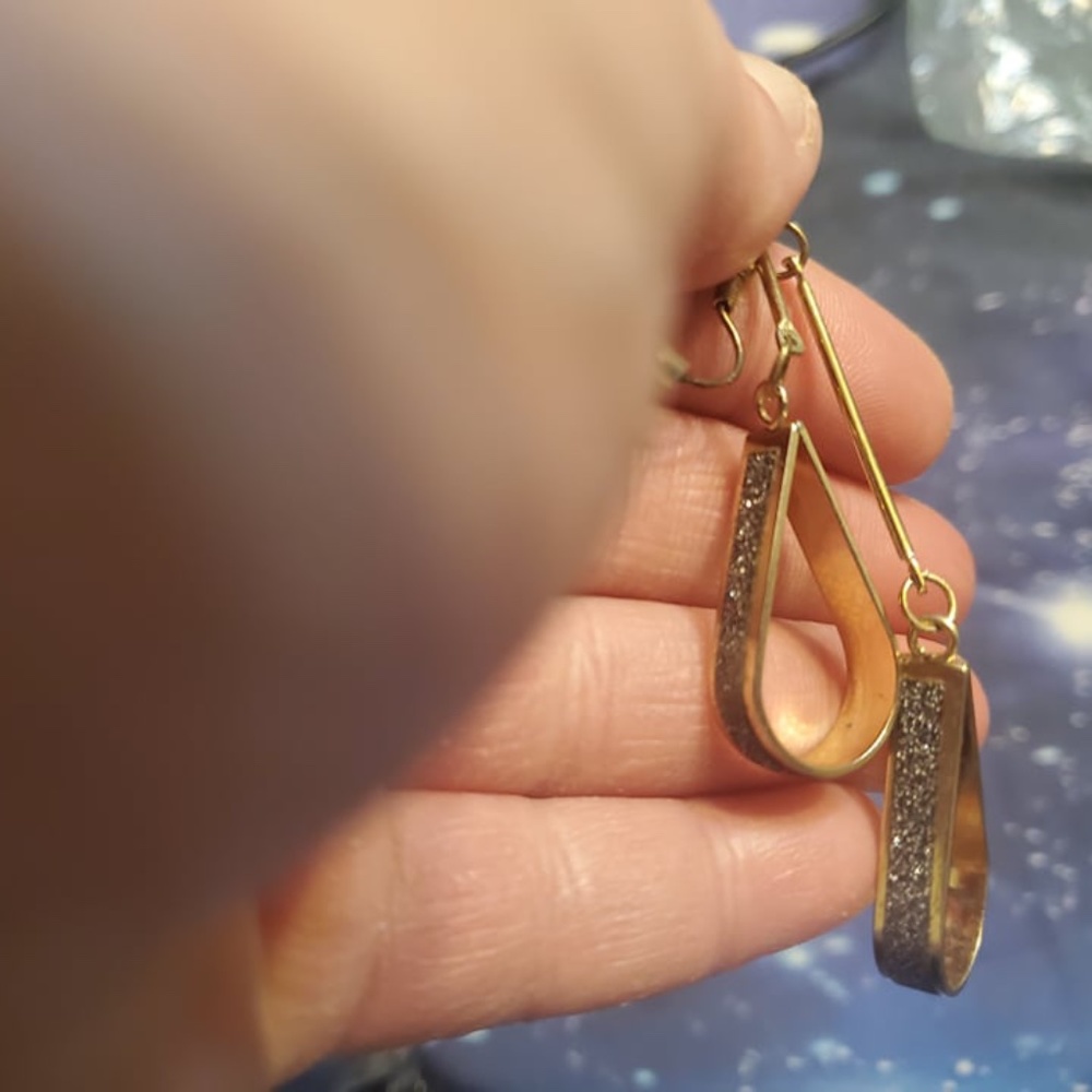 two earrings that don't have matching pair